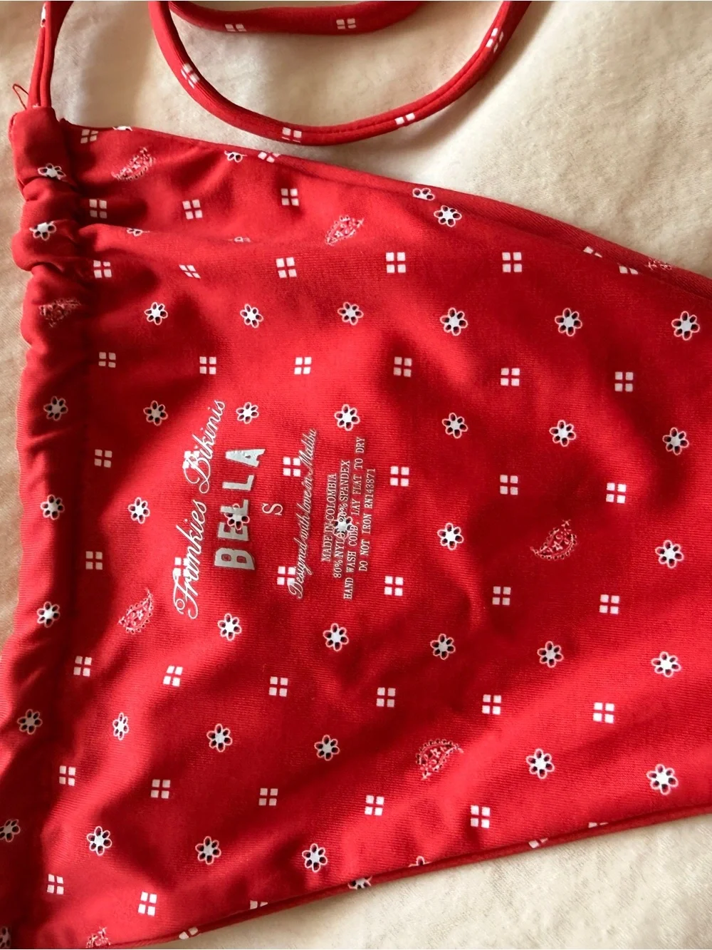 Frankie’s bikinis X Bella Hadid Red Polka Dot Tie-Side Bikini bottom